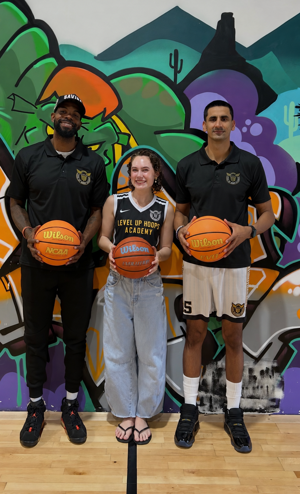 Level Up staff and athlete together in the academy gym